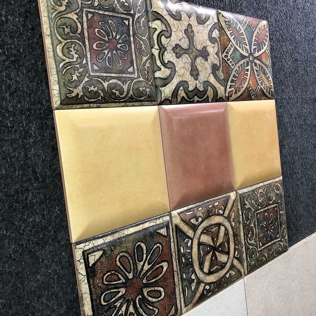 Decorative and plain bathroom tiles on display at RK Sanitarywares Surat
