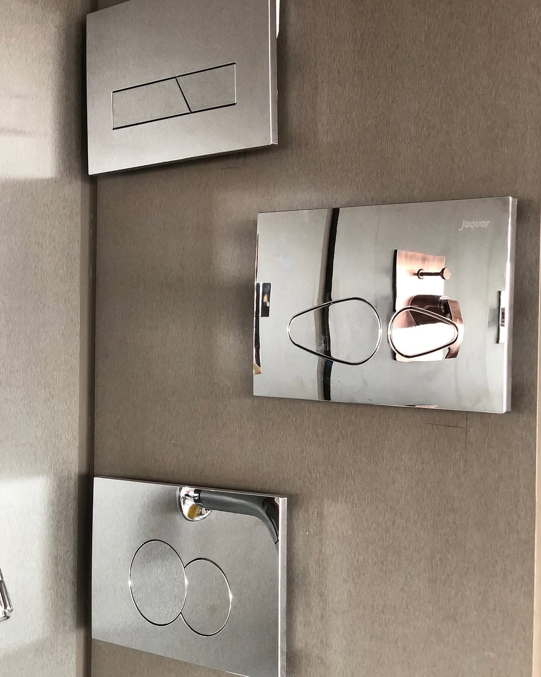 Concealed cistern flush plates in chrome and rose gold finishes