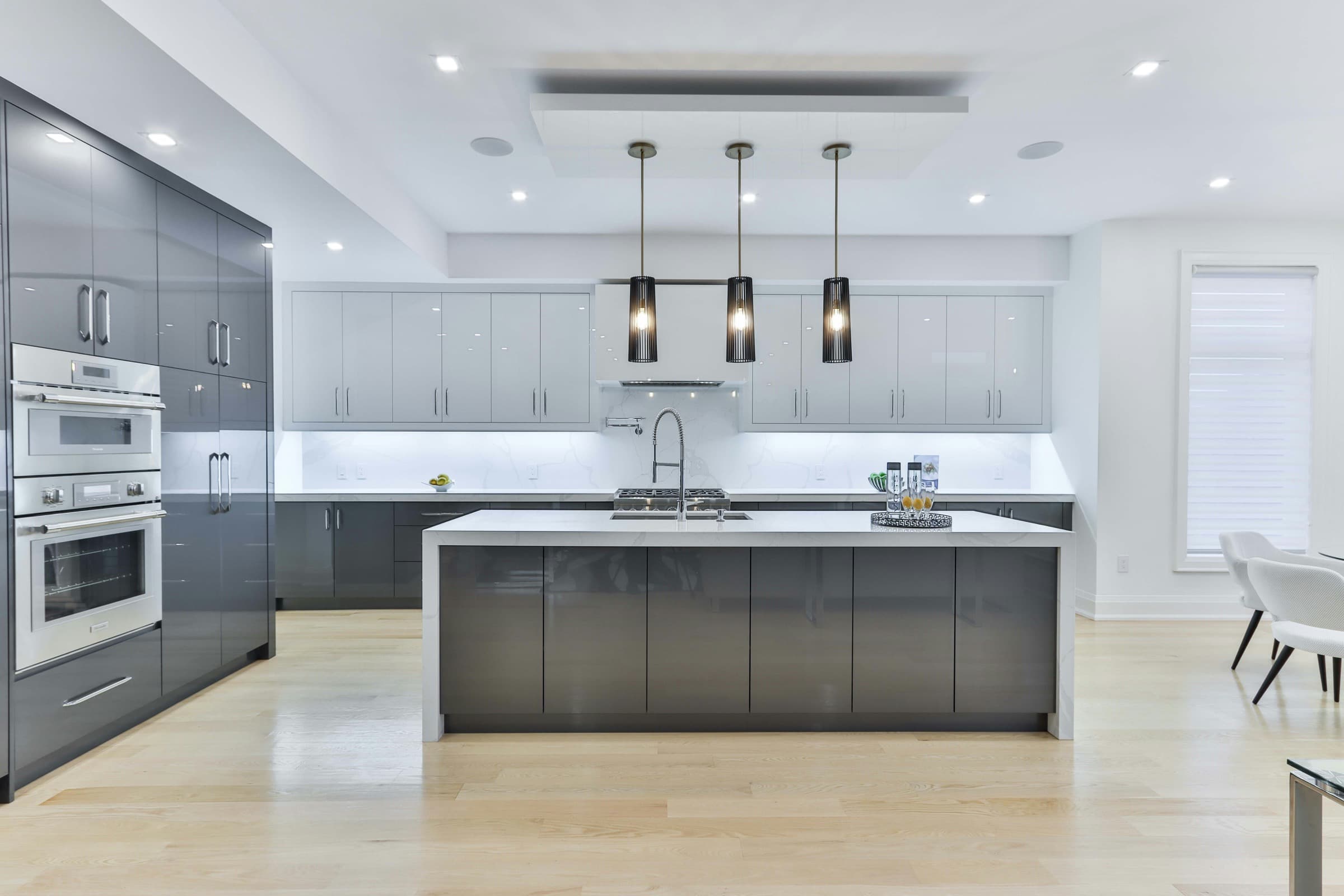 Modern kitchen with stainless steel sink and clean cabinetry