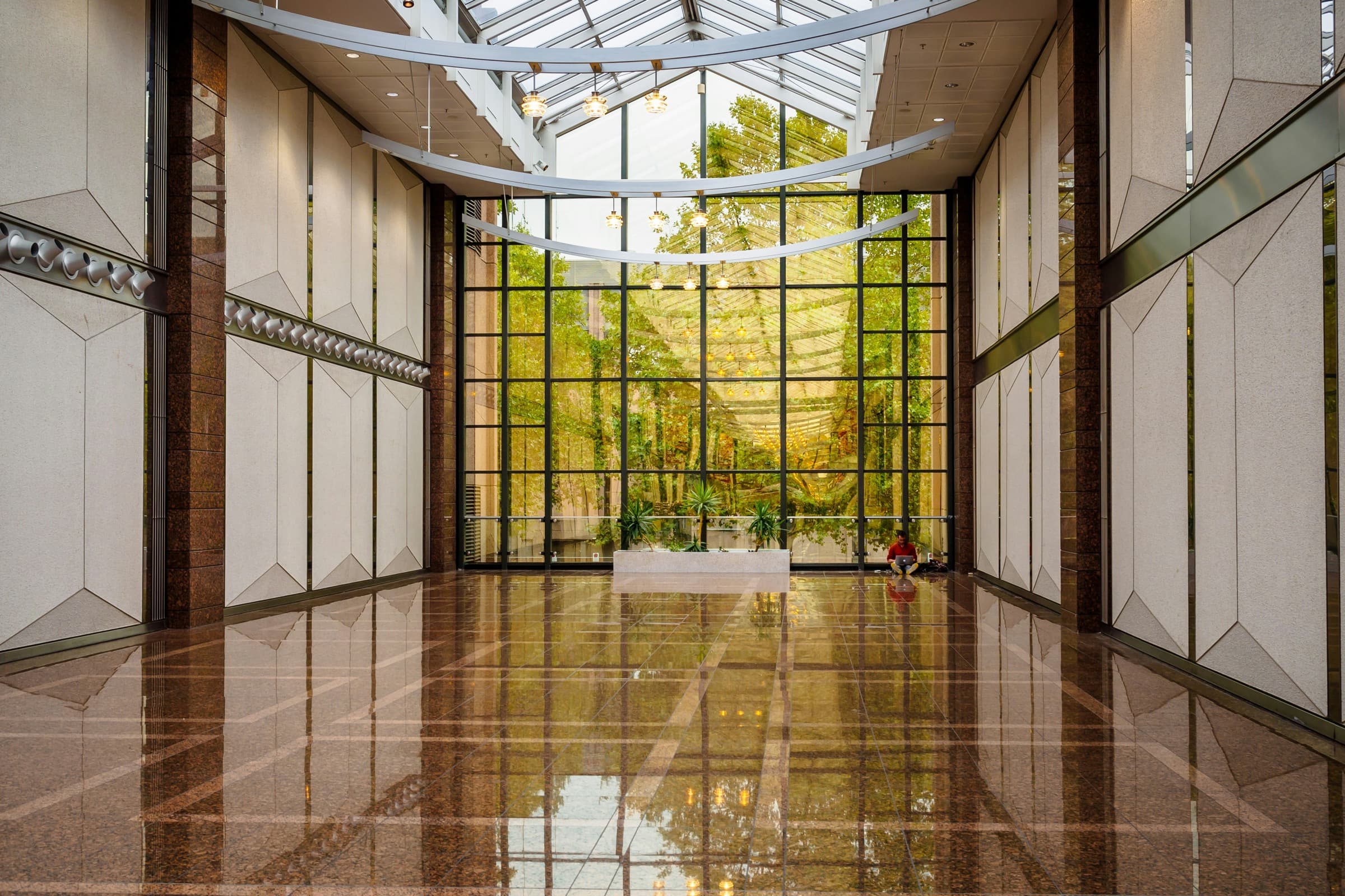 Polished tile flooring in a bright architectural interior